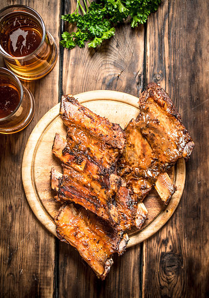 istock Smoked ribs grilled with beer and parsley. 603257120