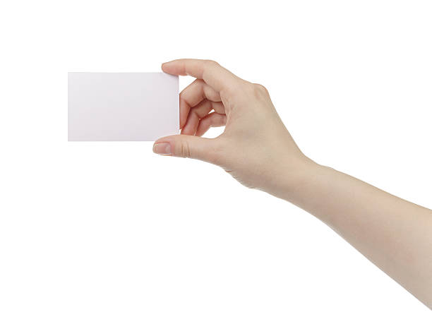 istock young woman hand hold and showing empty paper card 603257192