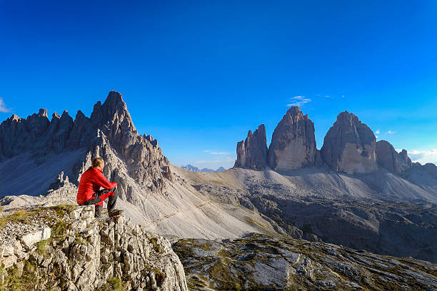 istock Alpine climber look to Three pinnacles, European Alps 603257376