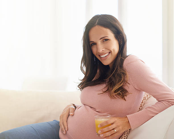 Free Stock Photo of Pregnant woman holding a glass of juice | Download ...