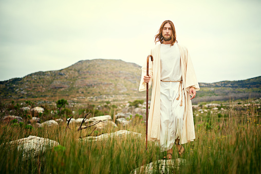 Portrait of Jesus walking alone in the wilderness