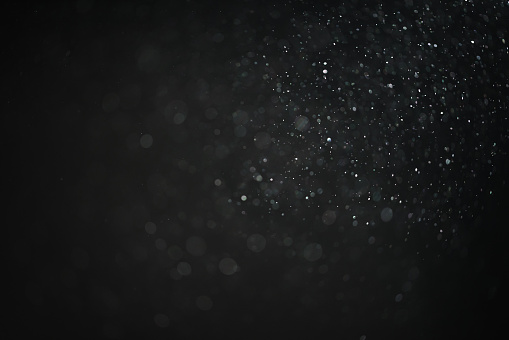 dust particles overblack background fx backdrop, real photo no cgi