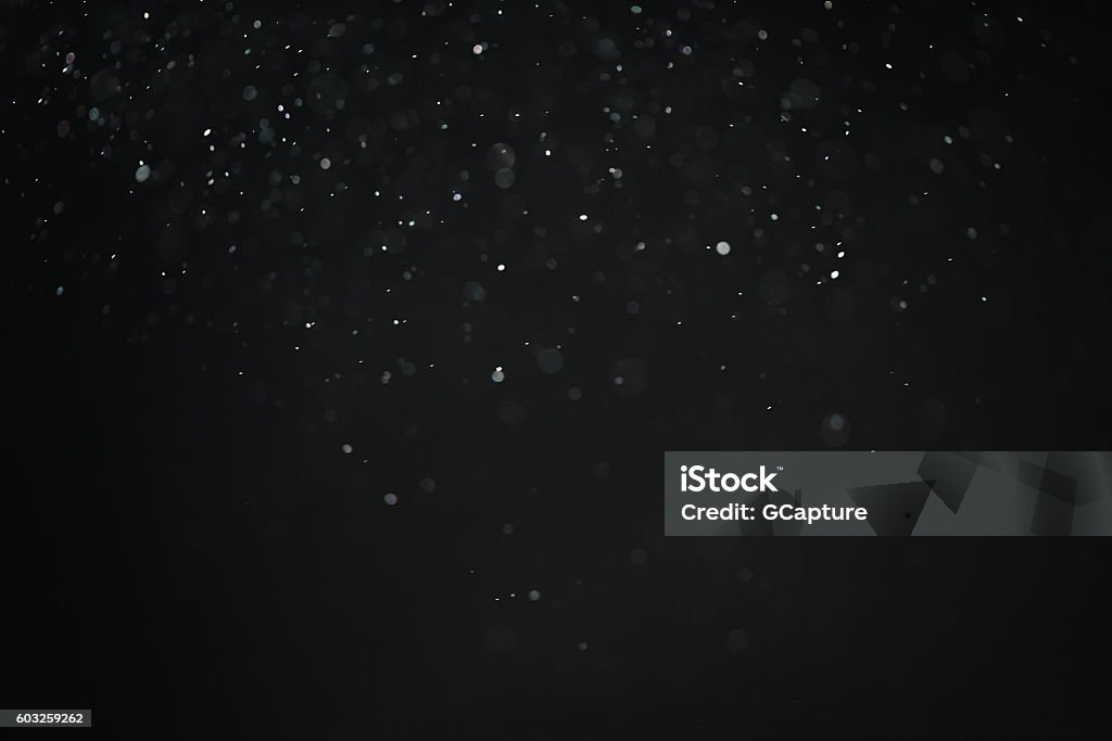 dust particles overblack background fx backdrop dust particles overblack background fx backdrop, real photo no cgi Particle Stock Photo