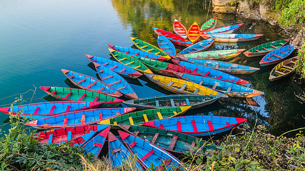 Colorful boats on Phewa Lake stock photo