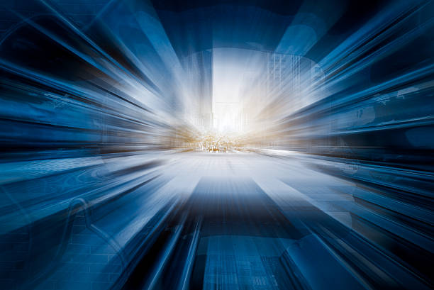 istock abstract and blurred light trails with cityscape in background 603260772