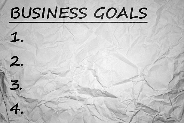 istock Business goals with crumpled paper background 603261640