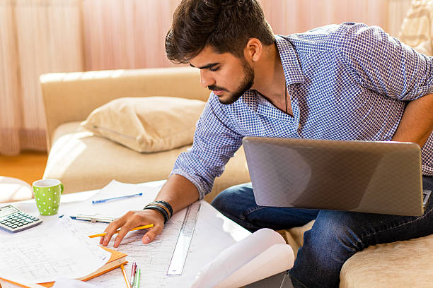 istock Young male student working at home. 603261852
