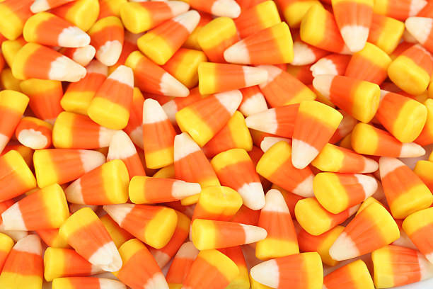 istock Halloween candy corns background, close up 603262536