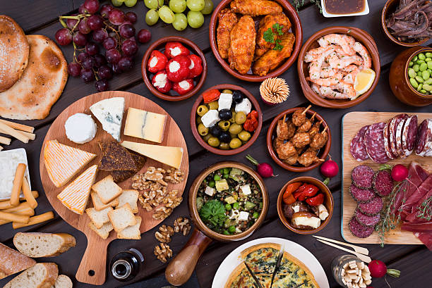 tapas food Top view of different tapas food recipes. Delicious table of foods. appetizer stock pictures, royalty-free photos & images