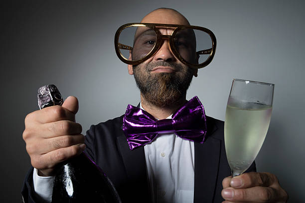 istock Man of sunglasses with champagne. 603267974