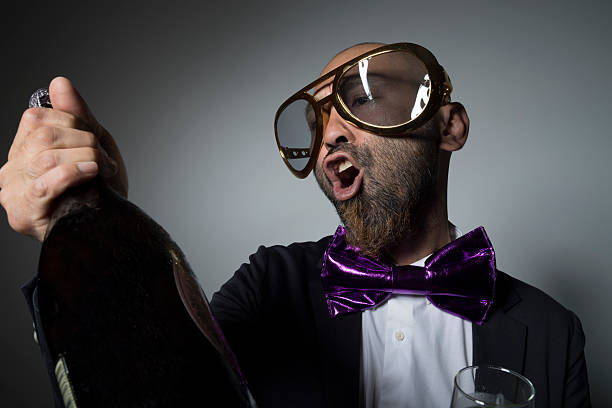 istock Man of sunglasses with champagne. 603268266