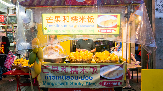 Bangkok, Thailand - September 3, 2016: Night market for vender selling  mango on chinatown (Yaowarat) Road,the main street in Chinatown, once of Bangkok landmark and important street for more foods very delicious for thai-chinese style. Photo taken on: 3 September  , 2016