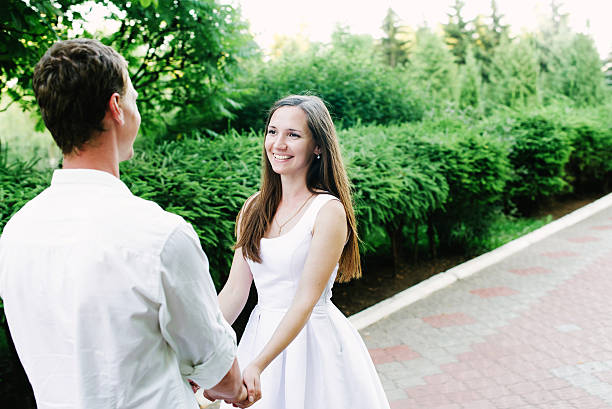 istock couple smiling at each other looking lovely 603269000