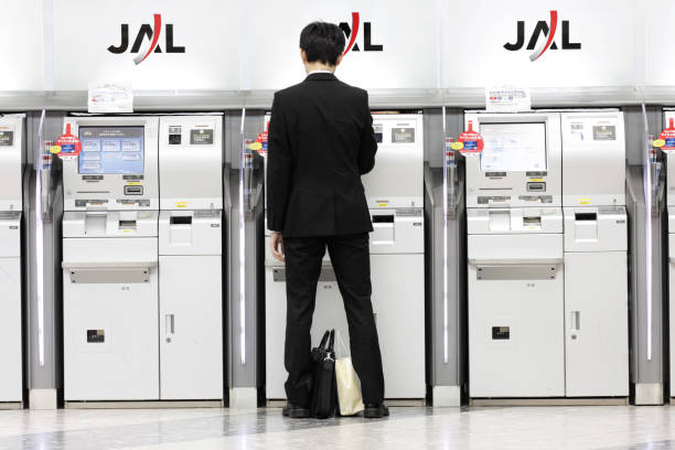 JAL check-in counter at New Chitose Airport in Sapporo stock photo
