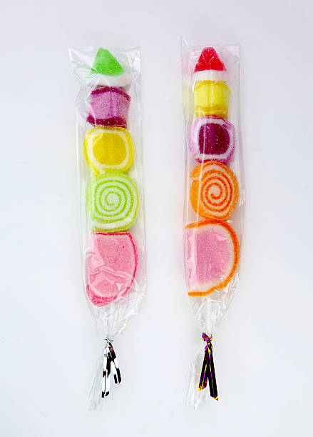 istock Sweet thai lollipops on white background 603269762