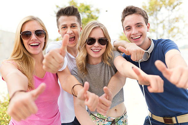 istock Friends showing thumbs up sign 603271440