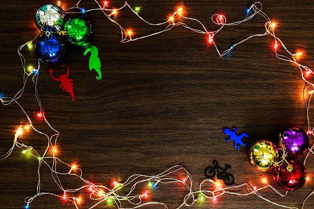 istock colorful light on wood texture for christmas 603272238
