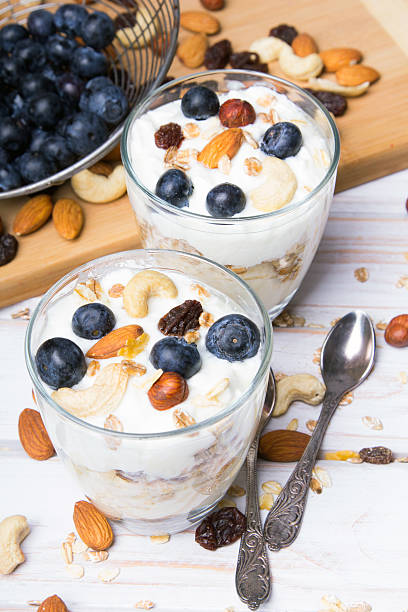 istock Healthy dessert with yogurt, nuts, oats and blueberries 603275686