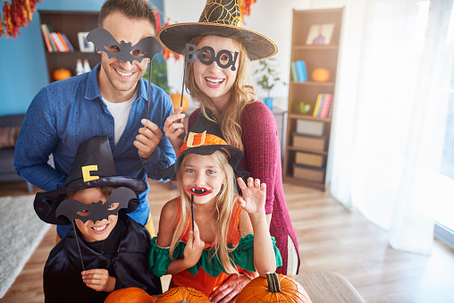 Family Wearing Funny Halloween Masks Stock Photo - Download Image Now -  Family, Halloween, Stage Costume - iStock