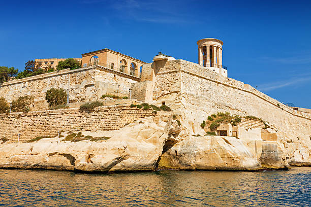 istock Sunny view of Siege Bell War Monument from the sea. 603280012