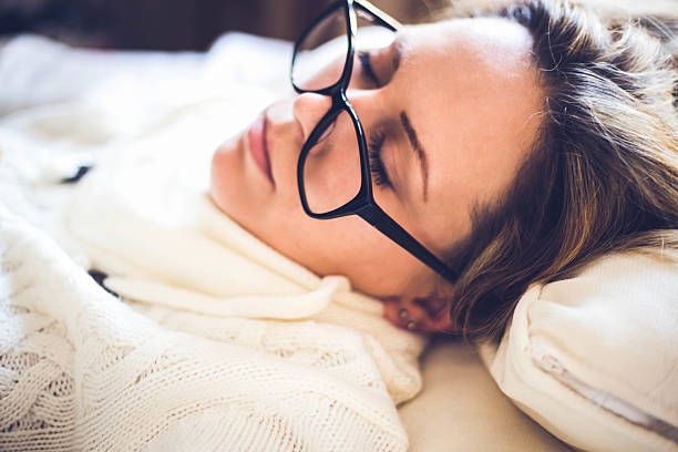 istock Woman sleeping on the bed 603281046