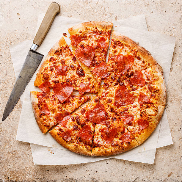 istock Heart shape sliced Pepperoni Pizza 603281972