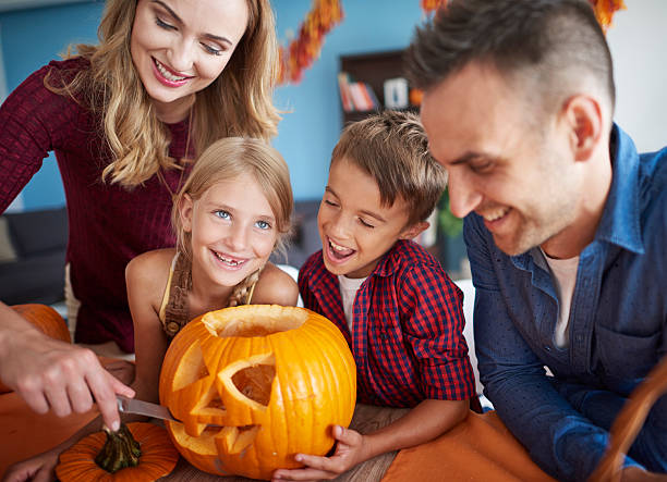 istock Family having fun together during halloween 603284742