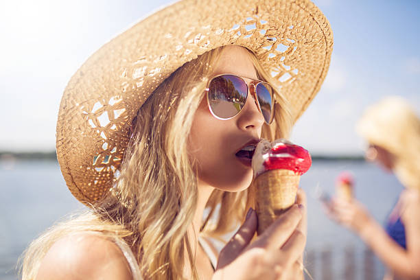 istock Sensual girl eating ice cream 603286344