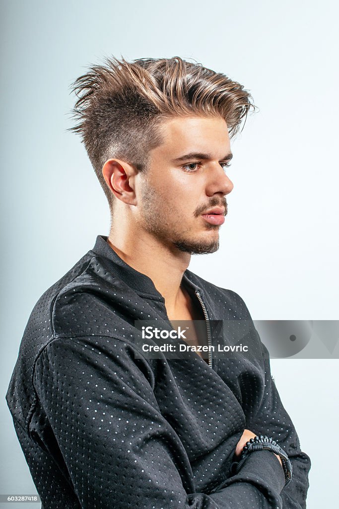 Handsome Youg Male Model With Modern Hairstyle Stock Photo - Download Image  Now - Adult, Adults Only, Affectionate - iStock