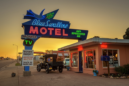 Tucumcari, New Mexico, USA - May 13, 2016 : Historic Blue Swallow Motel at sunset This building is listed on the National Register of Historic Places in New Mexico as a part of historic U.S. Route 66.