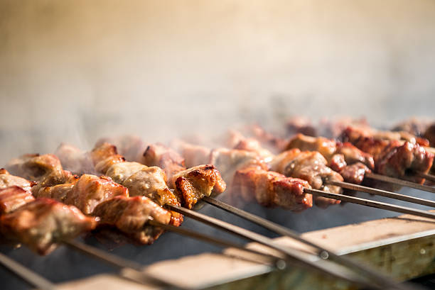 delicious barbecued souvlaki - souvlaki imagens e fotografias de stock