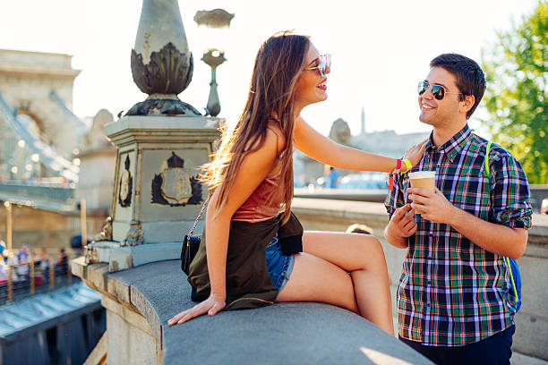 istock Young couple spending summer weekend in sightseeing 603293736