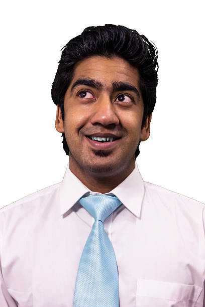 istock Cheerful young business man looking away 603306466