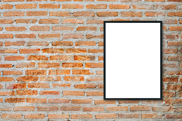 istock Mock up blank poster picture frame on brick wall. 603306742