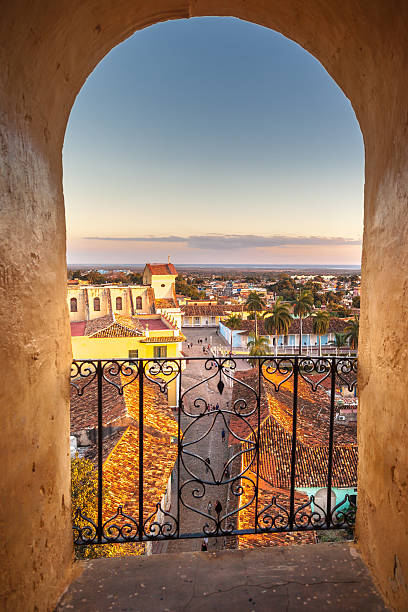Inside The Bell Tower Stunning views over Trinidad de Cuba from inside the bell tower of the church trinidad culture stock pictures, royalty-free photos & images