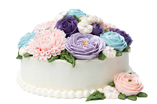 istock Birthday cake with colorful flowers isolated 603313474