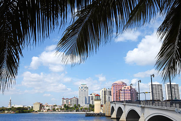 istock Palm trees along the West Palm Beach Florida skyline 603314026