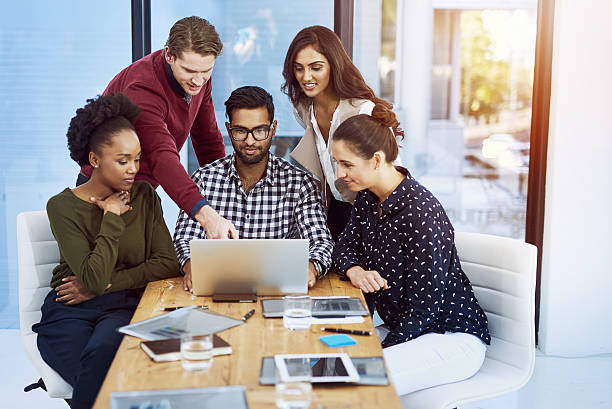 istock Everyone is coming together to work on the new project 603315164