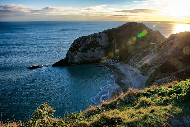 istock High Angle View Of Cliff By Sea Against Sky 603765721
