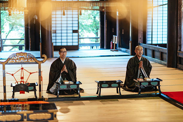 istock Two monks in Chijon-ji Shrine during afternoon prayer 603824268