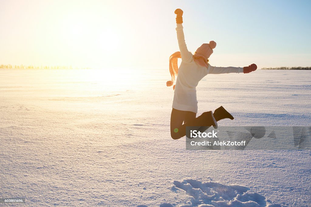 Happy girl with a red scarf on the winter Happy girl with a red scarf on the winter background Winter Stock Photo