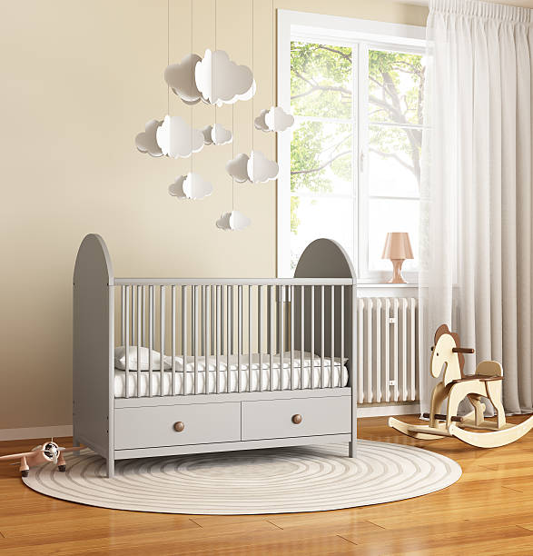 Beige and grey nursery baby room with rug