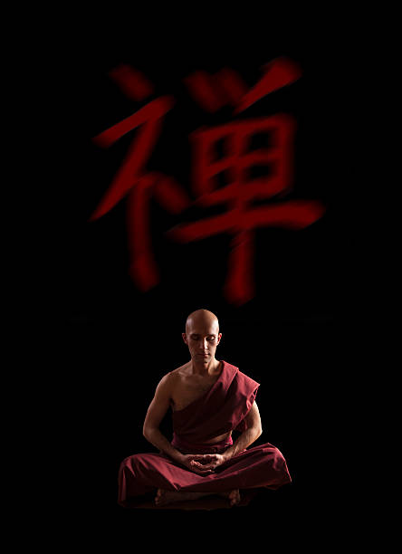 istock buddhist monk in meditation pose over black background 603852024