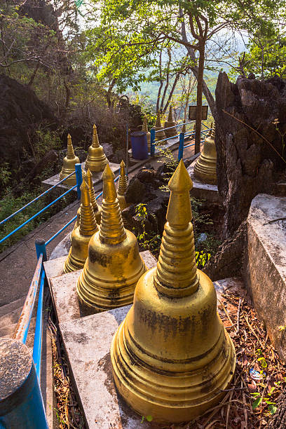 istock pagodas be side on the way to hill top 603853008