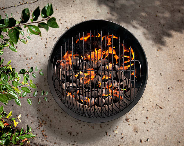 istock Charcoal BBQ on a Cement Patio 603854722