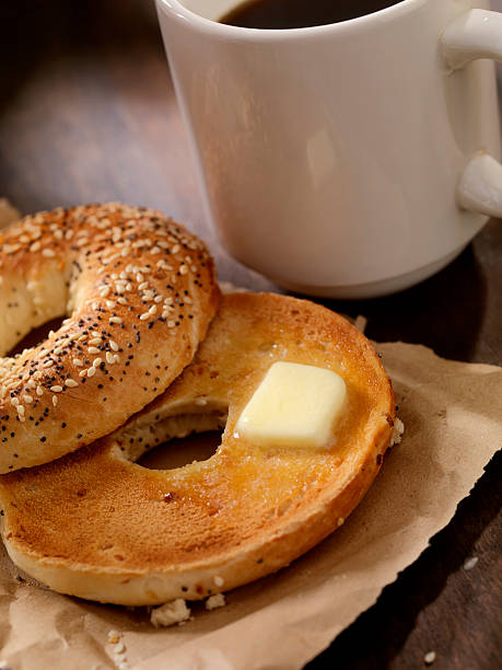 istock Toasted Bagel with Butter and a Coffee 603856738