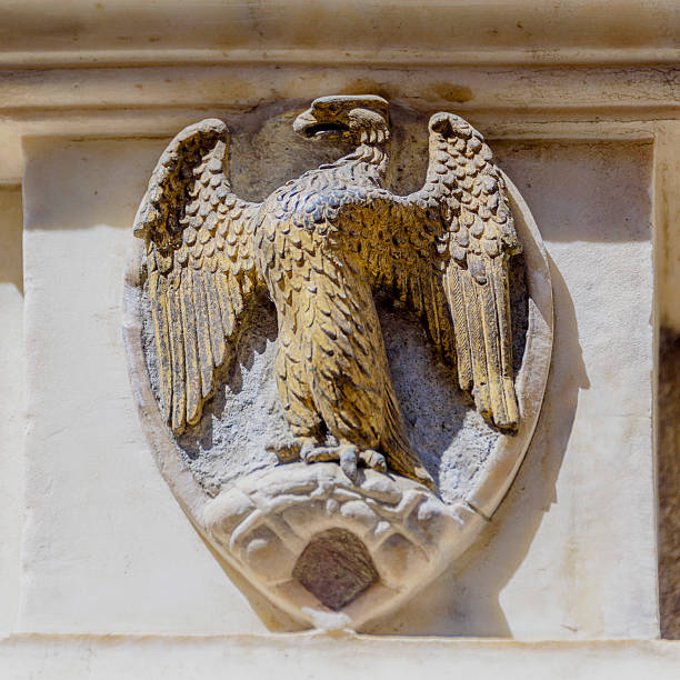istock Eagle in a crest carved on a wall in Florence 603861810
