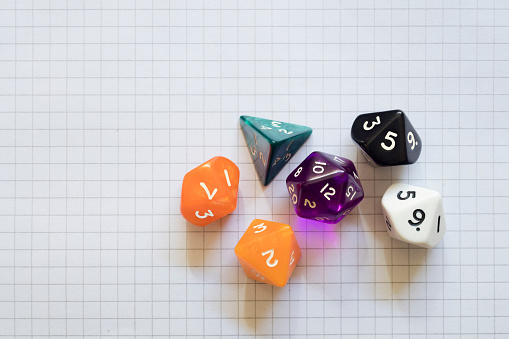 Group of role dices on a paper background