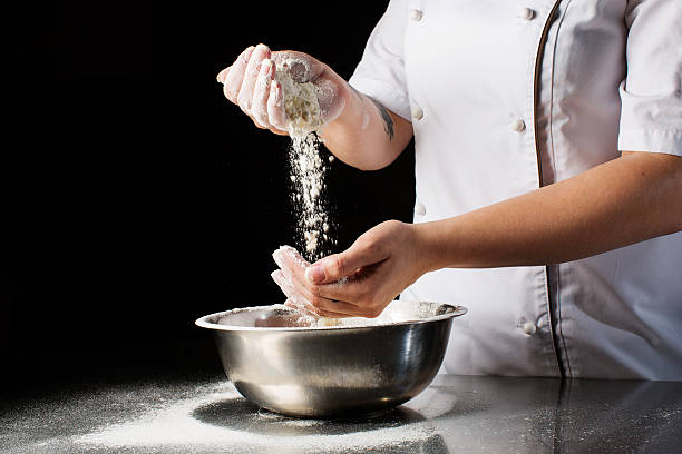 istock Woman hands kneading dough. 603862132
