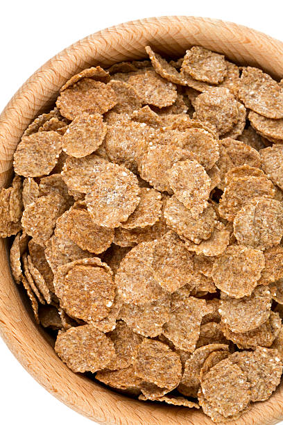 istock pile of bran flakes isolated on white 603862274